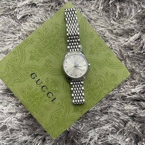 Gucci Women's Silver Watch with Patterned Bracelet